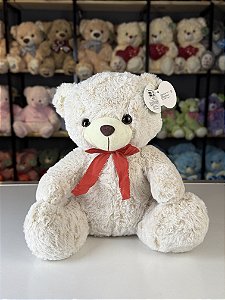 Urso pelúcia bege com laço -30cm