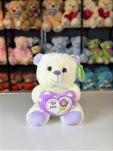 Urso pelúcia com coração florzinha cores -20cm und.