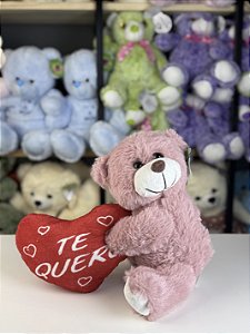 Pelúcia urso rosa segurando coração  -22cm