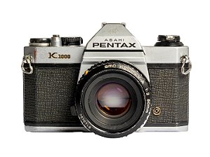 Câmera 35mm - Pentax K1000 (8.5/10) + Lente 55mm f/2 (9/10) + Filme + Alça