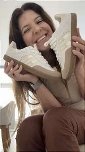 Tenis Dani Lavie Branco Com Dourado