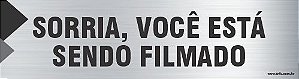 Placa de identificação sorria, você está  sendo filmado