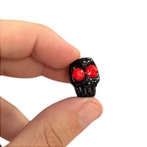 CAVEIRA COM FURO M PRETO COM STRASS VERMELHO