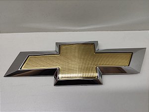Emblema Gravata Dourada Tampa Traseira Gm S10 94724961 C17