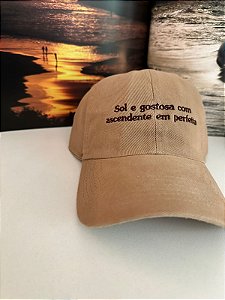 Boné: "Sol e gostosa com ascendente em perfeita"