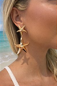 BRINCO DUAS ESTRELA DO MAR ORGANICO DOURADO