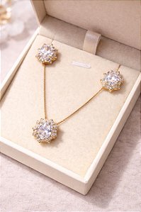 CONJUNTO OVAL COM CRAVAÇÃO CRISTAL DOURADO