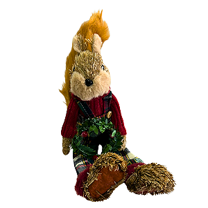 Esquilo natal sentado de palha macho