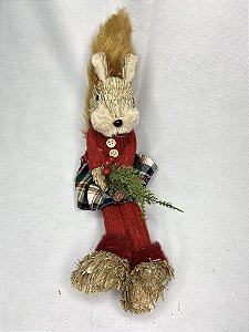 Esquilo natal sentado de palha fêmea