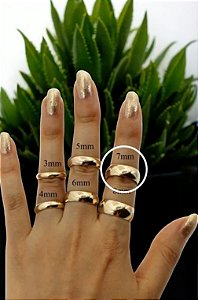 Par de Alianças pesando 18 gramas de Ouro Amarelo 18k. Largura 7mm