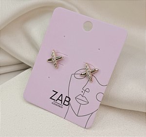 Brinco MOCHI mini X cravejado de zirconia folheada a ouro