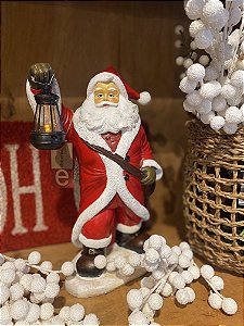 Papai noel com lampião vermelho