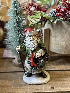 Papai Noel verde em resina 19cm