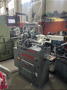Torno automático Traub A25 Plus+ com Revólver estrela TS e alimentador