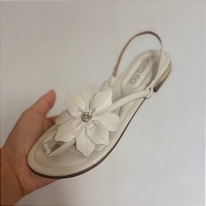 Rasteira flor beira rio