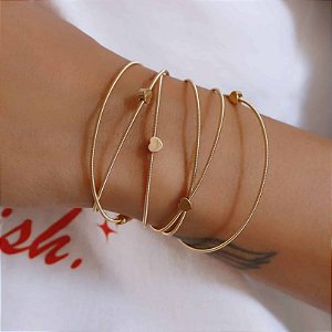 PULSEIRA DOURADA CORDA DE VIOLAO COM CORAÇÕES LISOS - FAZ VÁRIAS VOLTAS - FECHO IMÃ