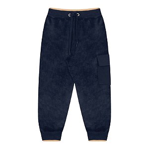 Calça em pelinhos na cor azul marinho com detalhes em mostarda