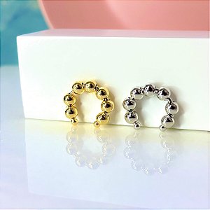 Piercing bolinhas