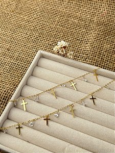 PULSEIRA CRUZ COM GOTAS EM ZIRCONIAS BANHADA A OURO