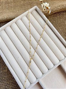COLAR GRAVATA BOLINHAS BANHADO A OURO