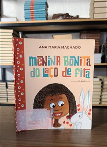 Menina bonita do laço de fita