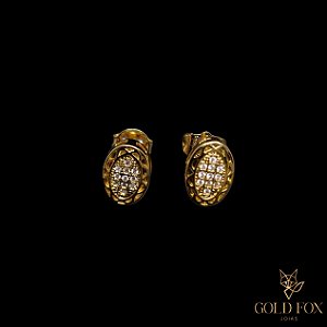 BRINCO OVAL LATERAL VAZADA - BANHADO A OURO 18K