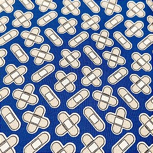 Tecido Tricoline para Patchwork com Estampa de Curativos em Fundo Azul Marinho