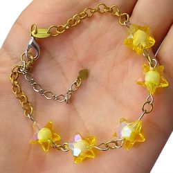 Pulseira Em Acrílico Em Formato de Estrelas No Bruto Pronto Para o Banho Tamanho Aprox: 21cm Extensor: 8,5cm Peso: 5,8 gramas REF: BRU686