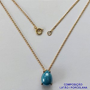 GARGANTILHA NO BRUTO PRONTA PARA O BANHO - (CX64) GARGANTILHA COM CORRENTE 45CM - PINGENTE EM PORCELANA 9X13MM AZUL CLARO - COMPOSIÇÃO LATÃO / PORCELANA - PESO TOTAL: 2,9GR - BRU10872