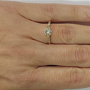 ANEL NO BRUTO PRONTO PARA O BANHO(CX111) - ANEL COM  PEDRA DE ZIRCÔNIAS  - PESO MEDIO 1,9GR - COMPOSIÇÃO: LATÃO / ZIRCÔNIA - ANEL000410