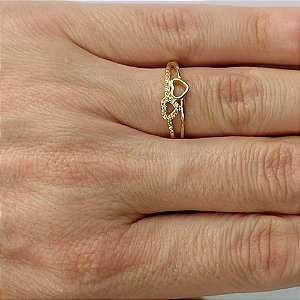 ANEL NO BRUTO PRONTO PARA O BANHO -  (cx.111) (AX000378W) ANEL COM CORAÇÃO CRAVEJADO COM MICROS ZIRCÔNIAS - PESO MÉDIO 1,4GR - COMPOSIÇÃO: LATÃO / ZIRCÔNIA - ANEL000499