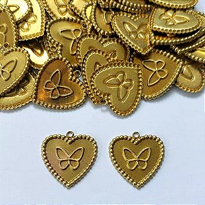 ACESSÓRIO NO BRUTO PRONTO PARA O BANHO - (CX.67) (V3970) CORAÇÃO COM BORBOLETA 22X23MM - PESO TOTAL 1,3GR - COMPOSIÇÃO: 100% LATÃO - BRU0003396