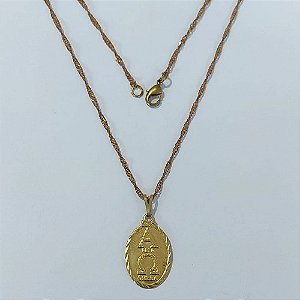 GARGANTILHA NO BRUTO PRONTA PARA O BANHO - (5216) GARGANTILHA COM CORRENTE SINGAPURA 45CM E PINGENTE ALFA OMEGA 20MM (5216) - PESO: 2,5GR - COMPOSIÇÃO: 100% LATÃO - BRU24024