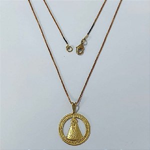GARGANTILHA NO BRUTO PRONTA PARA O BANHO - GARGANTILHA COM CORRENTE VENEZIANA 45CM E PINGENTE PINGENTE REDONDO VAZADO NOSSA SRA APARECIDA (3880) 19MM - PESO: 3,2GR - COMPOSIÇÃO: 100% LATÃO - BRU24027