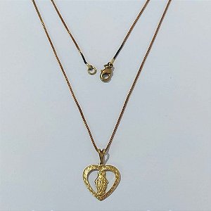 GARGANTILHA NO BRUTO PRONTA PARA O BANHO - GARGANTILHA COM CORRENTE VENEZIANA 45CM E PINGENTE PINGENTE CORAÇÃO VAZADO NOSSA SRA DAS GRAÇAS 15X17MM (2159) - PESO: 2,7GR - COMPOSIÇÃO: 100% LATÃO - BRU24030
