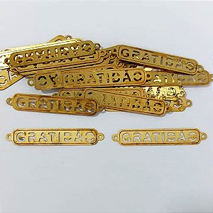 ACESSÓRIO NO BRUTO PRONTO PARA O BANHO - (084) ACESSÓRIO PLAQUINHA EM FOTO CORROSÃO PALAVRA GRATIDÃO COM DUAS ARGOLINHAS 7X39MM - PESO TOTAL 0,5GR - COMPOSIÇÃO: FOTO CORROSÃO - BRU0003828
