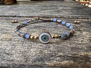 Pulseira Cristais Facetados Azul com Olho Grego