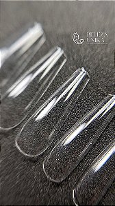 Postiça Realista Transparente com 100 unidades.