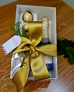 Caixa com visor e chocolates