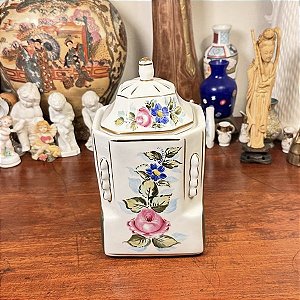 Potiche com decoração floral pintada à mão.