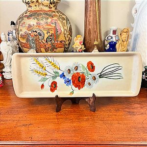 Travessa estilo rocambole em antiga porcelana Real.