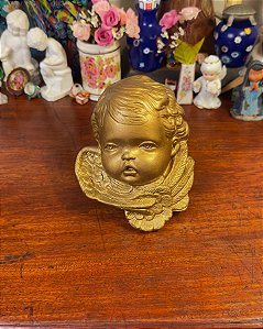 Busto angelical de parede.