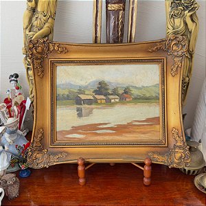 Quadro com pintura a óleo sobre madeira.