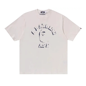 BAPE - Camiseta Garment Dye Spray Print "Creme" -NOVO-