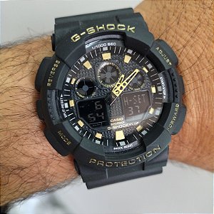 G-Shock GA-100 Preto/Dourado 50MM A Prova D'água