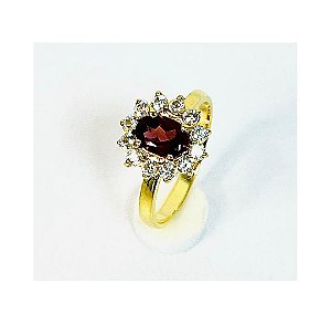 ANEL GRANADA COM 12 TOPÁZIOS INCOLORES