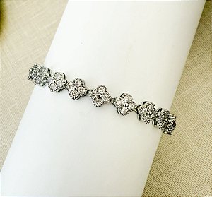 PULSEIRA RIVIERA FLOR RÓDIO CRAVEJADA