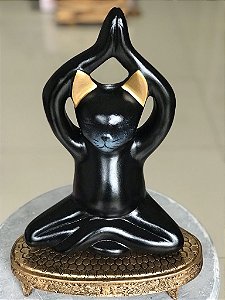 Gato Yoga alongando (preto/dourado)