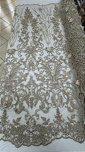 Tule bordado 3d com pedrarias nude,largura 130 cm composição 100% Poliéster.