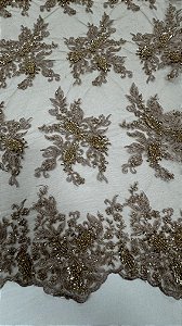 Tule bordado com pedrarias,nude  130 cm composição 100% Poliamida.